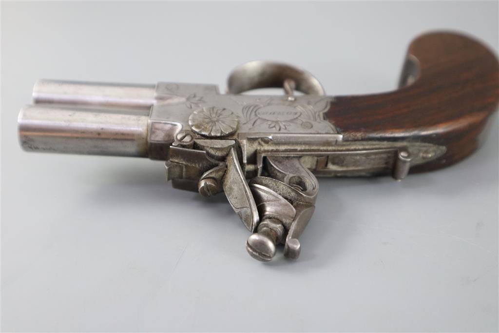 An early 19th century twin barrel flintlock pocket pistol, by Jn. & Geo. Jones of London, length 7.5in